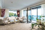 Pokoj Deluxe s výhledem na moře - obývací část