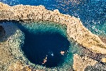 Deep blue hole at the world famous Azure Window in Gozo Island