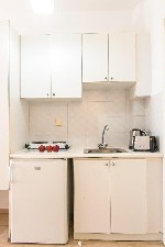 Pokoj s kuchyňským koutem