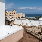 Úvodní foto junior suita s jacuzzi v centru města